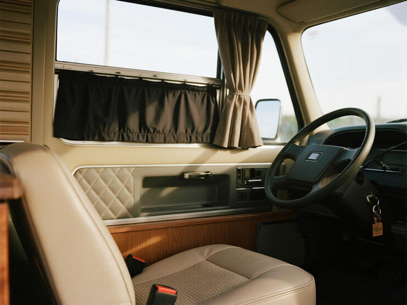 RV interior with sunshades and matching fabric decor
