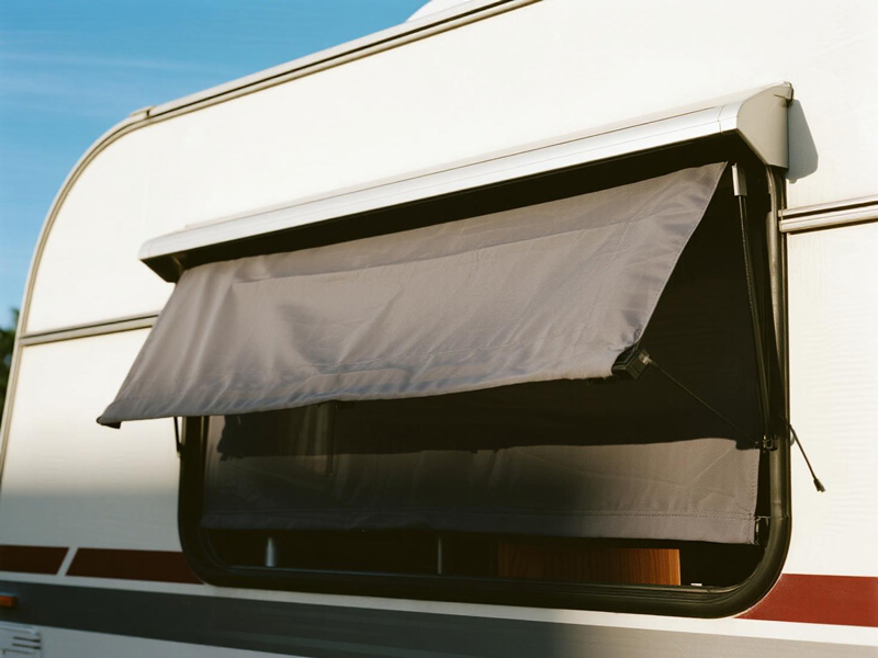 RV window with sunshade demonstrating light blocking