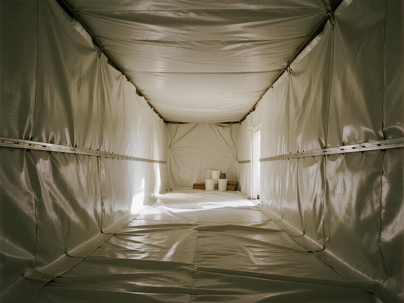 Container liner fabric installed inside shipping container protecting cargo