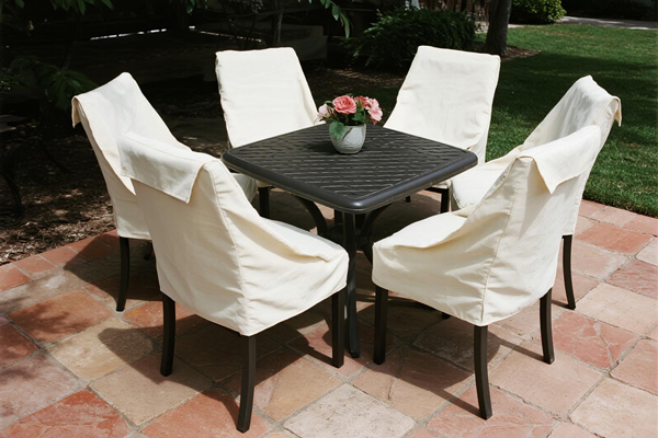 Patio dining set with protective covers