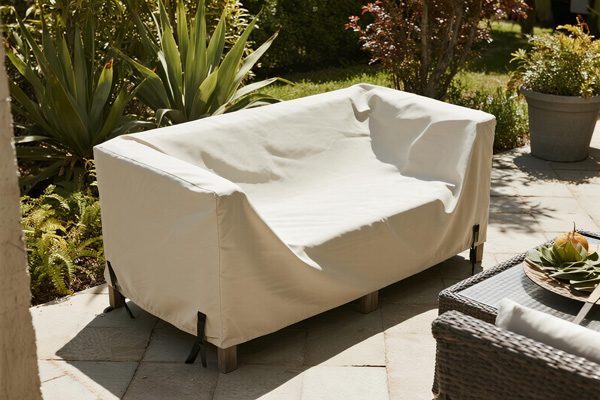Outdoor sofa set with protective covers