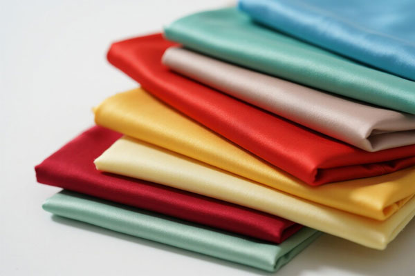 Polyester fabric sample showing smooth texture and finish