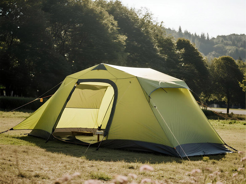 Lightweight Oxford fabric tent set up in mountainous camping area