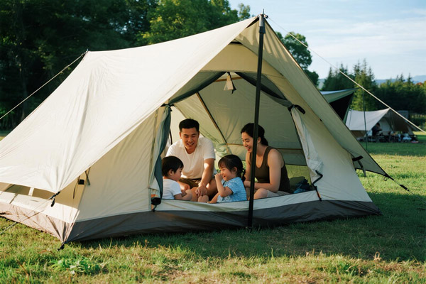 Family camping with Oxford tent in forest