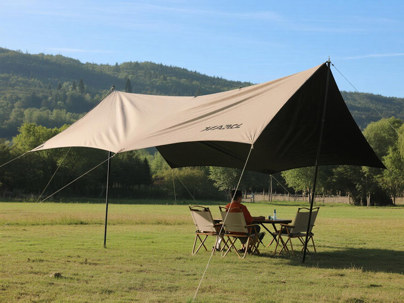 Oxford canopy protecting picnic setup from sun