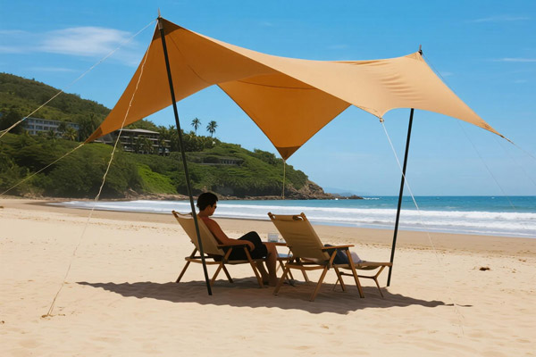 Oxford fabric canopy at beach with people relaxing